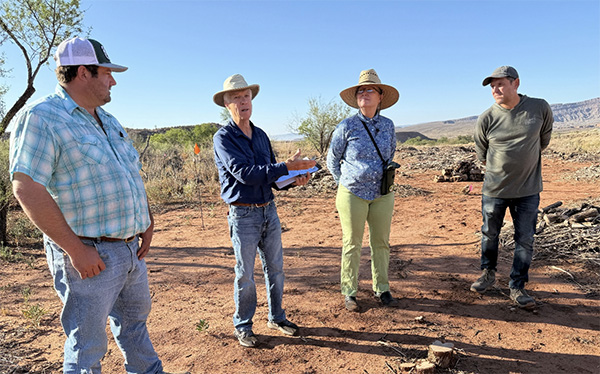 Conservation botanist Shaunna Goldberry joins Jake Benson, conservation planner with UDFA and the Natural Resources Conservation Service (far left), and Chris Courville, Best Friends Animal Society, Kanab (far right), to learn more about DPI practices from President Chuck Warren (second from left).